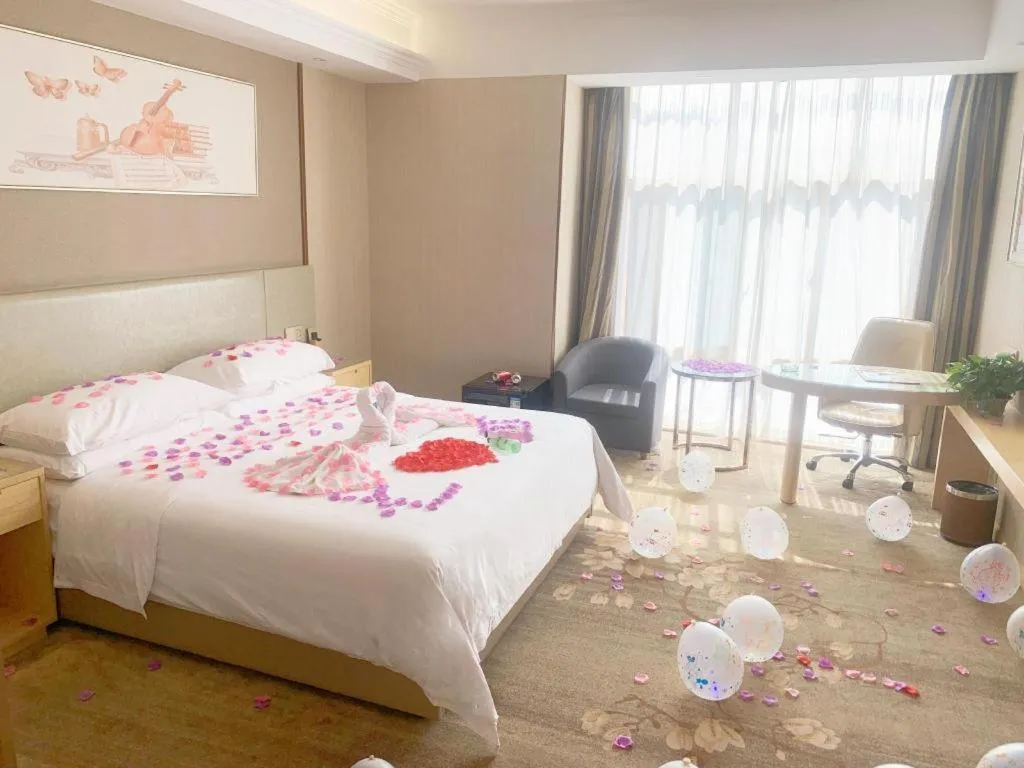Bed in Vienna Hotel Anhui Huainan Shou County South Gate of Ancient Town Jinrun Central City