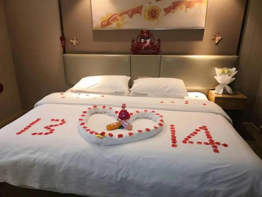 Bed in Vienna Hotel Anhui Huainan Shou County South Gate of Ancient Town Jinrun Central City