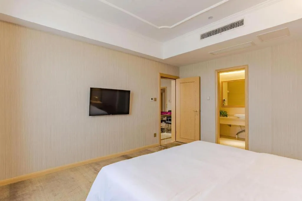 Bed in Vienna Hotel Anhui Huainan Shou County South Gate of Ancient Town Jinrun Central City