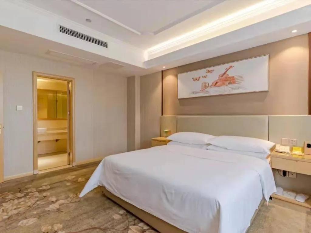 Bed in Vienna Hotel Anhui Huainan Shou County South Gate of Ancient Town Jinrun Central City