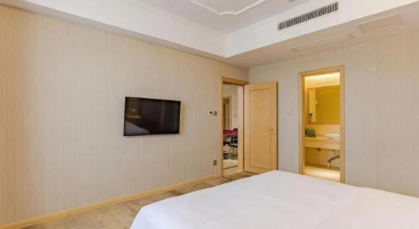 Bed in Vienna Hotel Anhui Huainan Shou County South Gate of Ancient Town Jinrun Central City