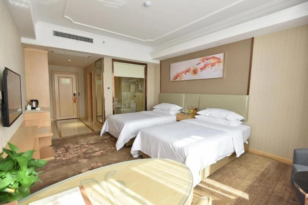 Bed in Vienna Hotel Anhui Huainan Shou County South Gate of Ancient Town Jinrun Central City