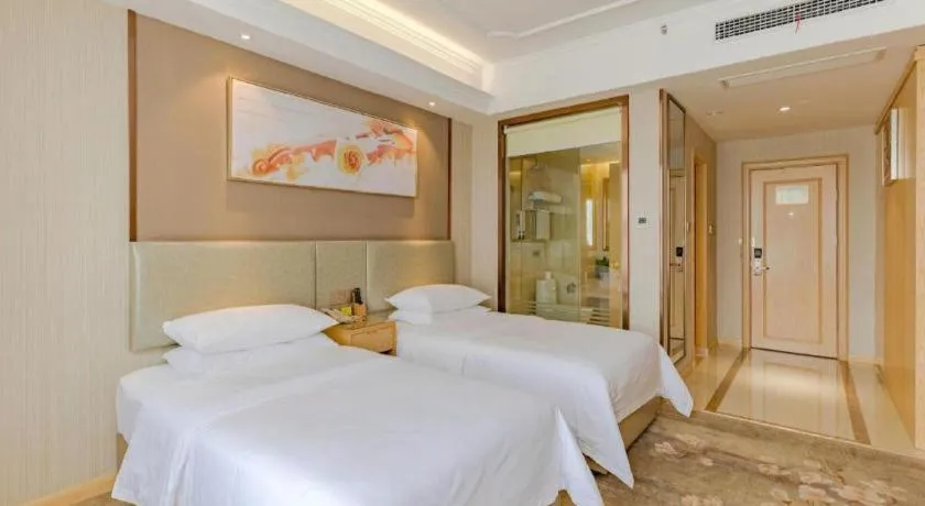 Bed in Vienna Hotel Anhui Huainan Shou County South Gate of Ancient Town Jinrun Central City
