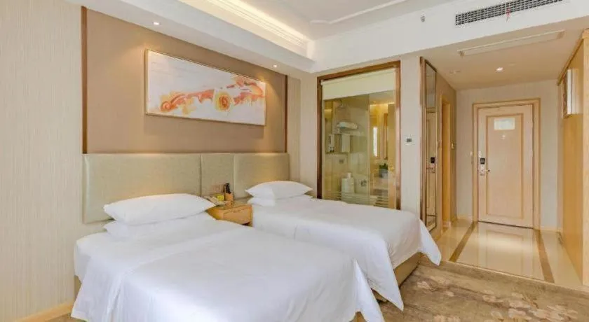 Bed in Vienna Hotel Anhui Huainan Shou County South Gate of Ancient Town Jinrun Central City