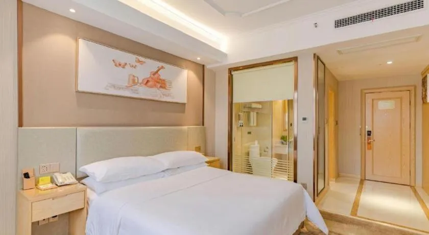 Bed in Vienna Hotel Anhui Huainan Shou County South Gate of Ancient Town Jinrun Central City