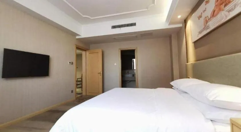 Bed in Vienna Hotel Anhui Huainan Shou County South Gate of Ancient Town Jinrun Central City