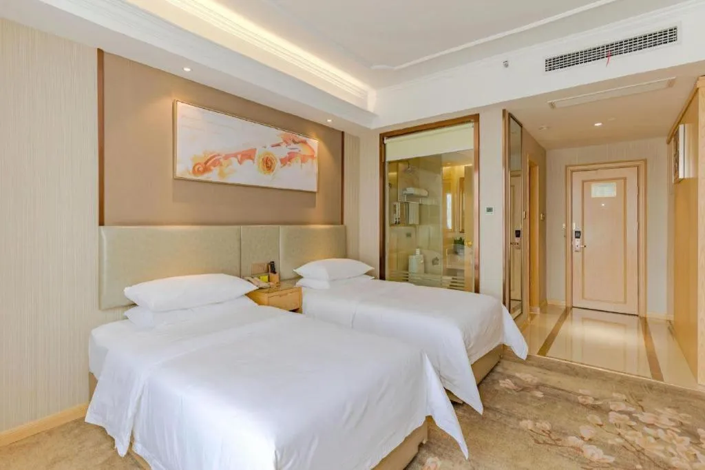 Bed in Vienna Hotel Anhui Huainan Shou County South Gate of Ancient Town Jinrun Central City