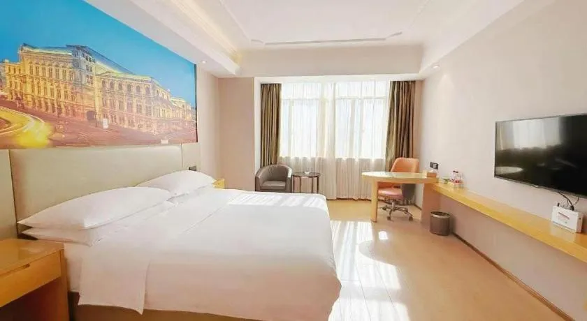 Bed in Vienna Hotel Anhui Huainan Shou County South Gate of Ancient Town Jinrun Central City