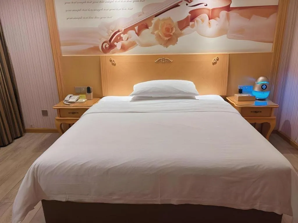 Bed in Vienna Hotel Guangdong Zhongshan Caihong Avenue