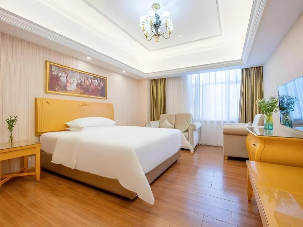 Bed in Vienna Hotel Guangdong Zhongshan Caihong Avenue