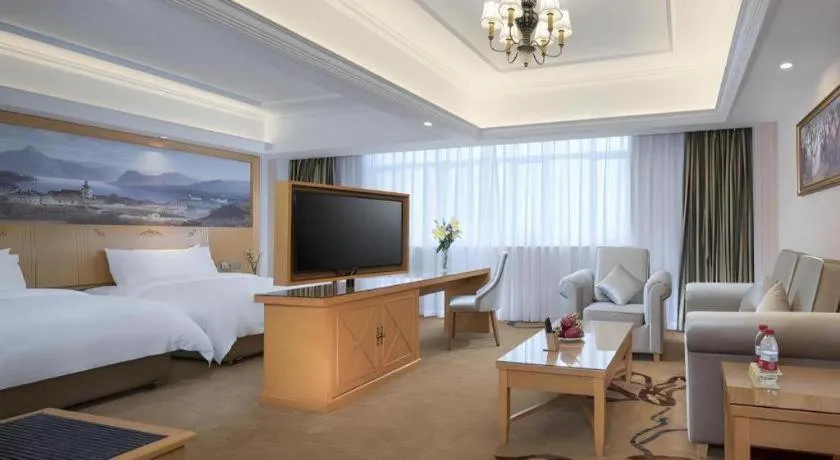 Bed in Vienna Hotel Guangdong Zhongshan Caihong Avenue