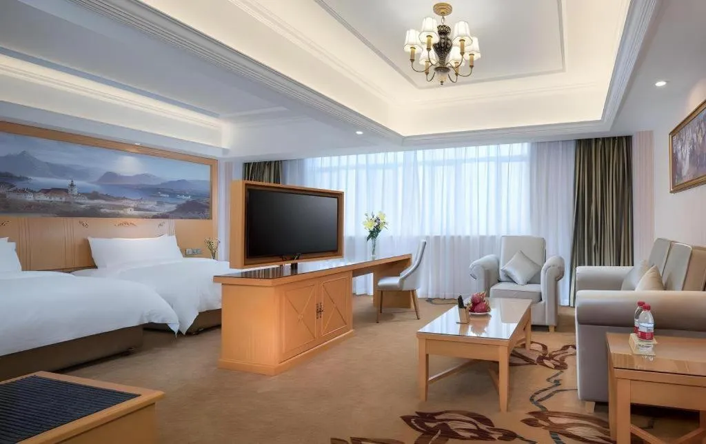 Bed in Vienna Hotel Guangdong Zhongshan Caihong Avenue