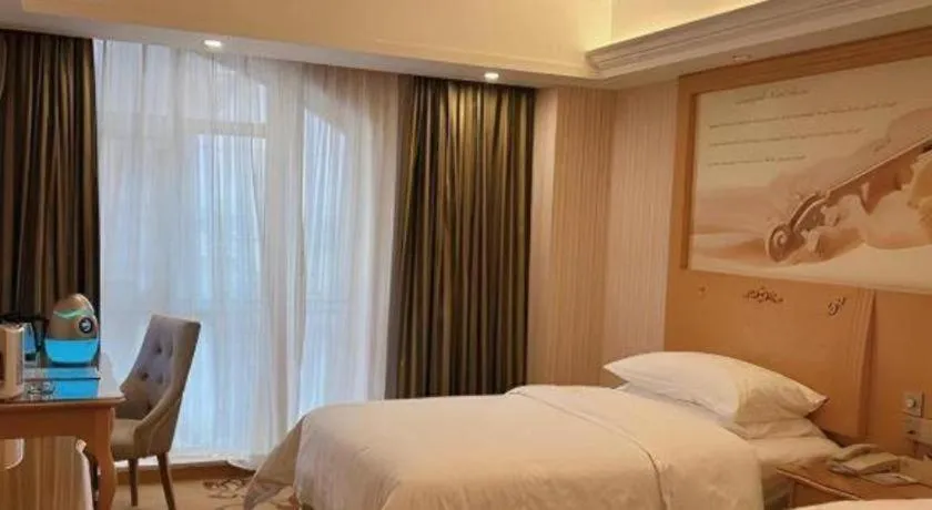 Bed in Vienna Hotel Guangdong Zhongshan Caihong Avenue