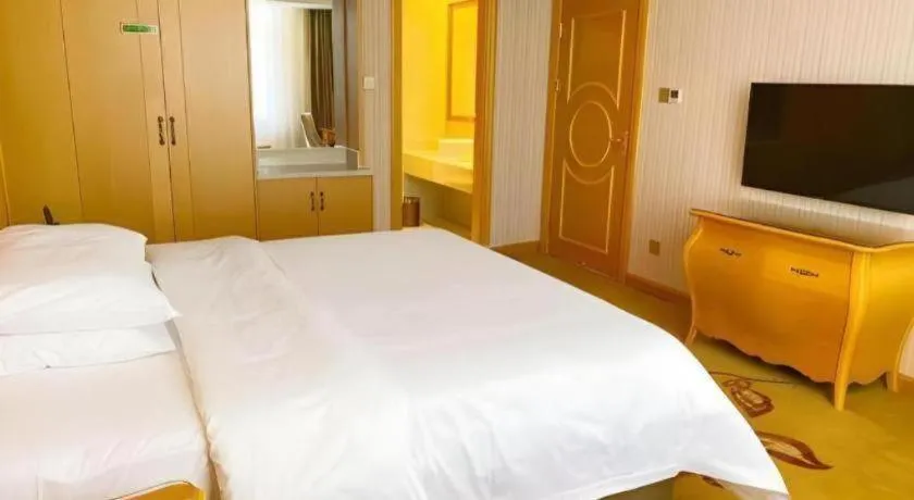 Bed in Vienna Hotel Guangdong Zhongshan Caihong Avenue