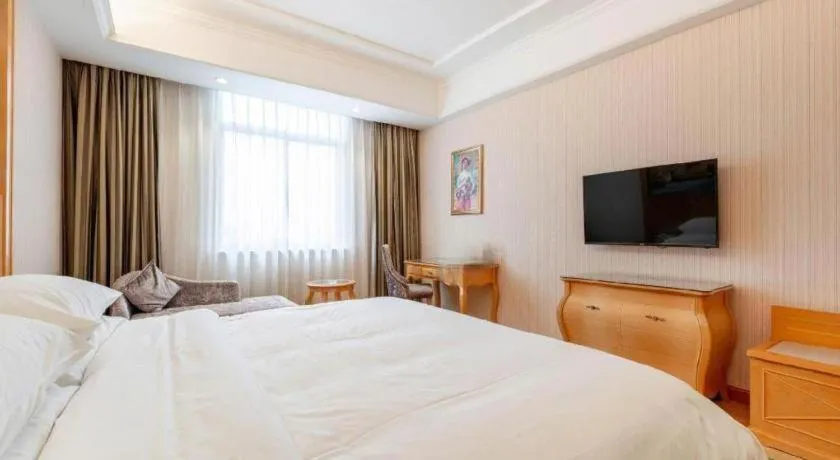 Bed in Vienna Hotel Changsha Yanghu Hanpu