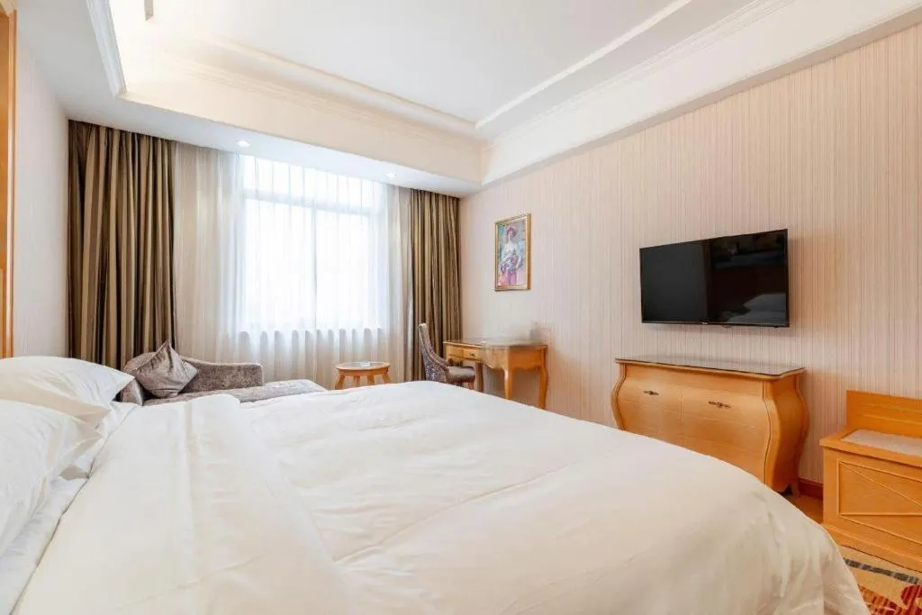 Bed in Vienna Hotel Changsha Yanghu Hanpu