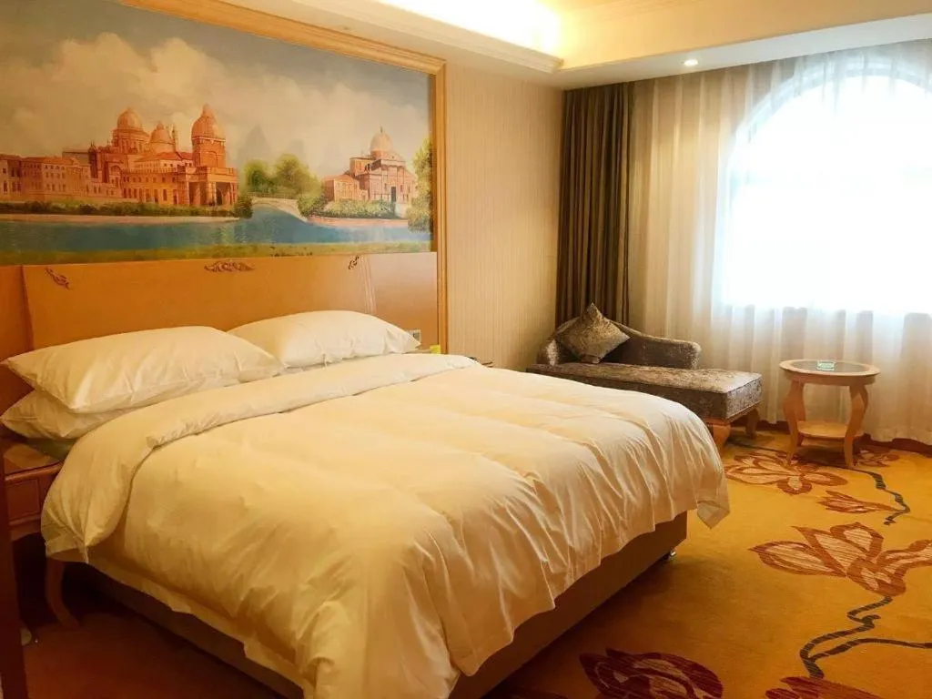 Bed in Vienna Hotel Changsha Yanghu Hanpu