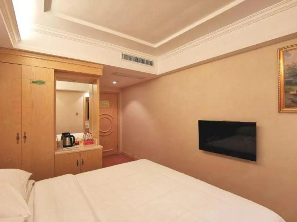 Bed in Vienna Hotel Shenzhen Window of the World Qiaochengdong Metro Station