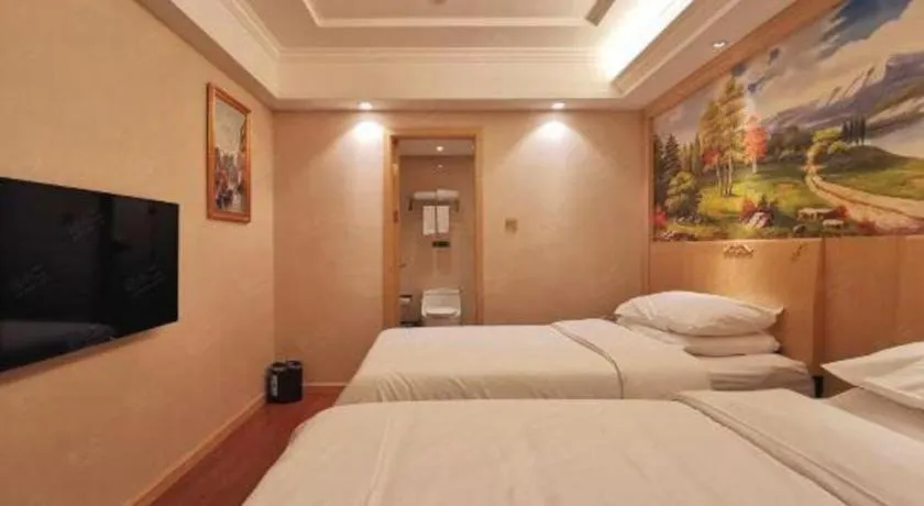 Bed in Vienna Hotel Shenzhen Window of the World Qiaochengdong Metro Station