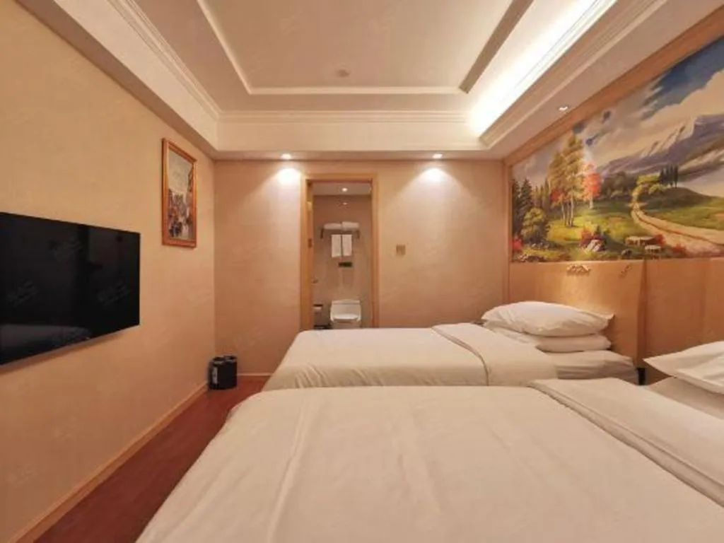 Bed in Vienna Hotel Shenzhen Window of the World Qiaochengdong Metro Station