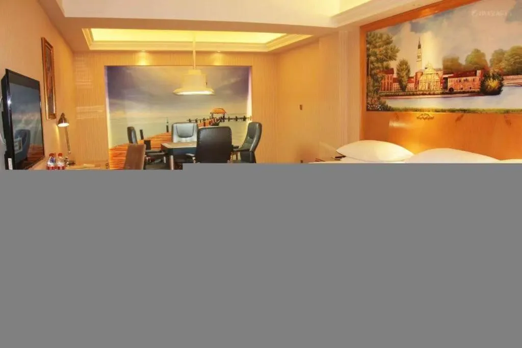 Bed in Vienna Hotel Guangdong Meizhou Fengshun