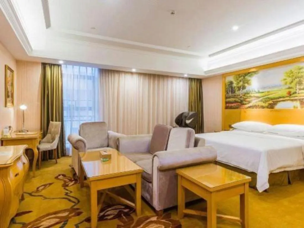 Bed in Vienna Hotel Guangdong Meizhou Fengshun