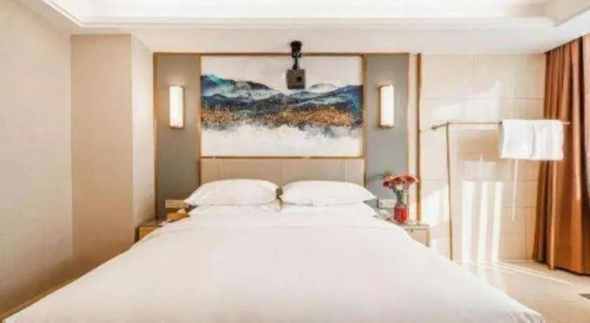 Bed in Vienna Hotel Shaanxi Xianyang Huitong China Square