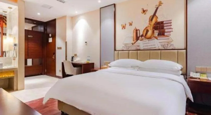 Bed in Venus International Hotel Kunming Baiyun Road Tongde Square