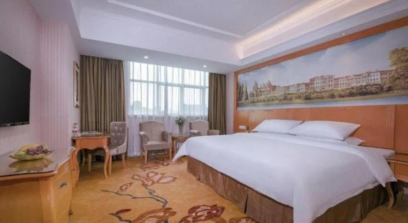 Bed in Vienna Hotel Guangdong Huiyang Qiuchang Yingbin Road