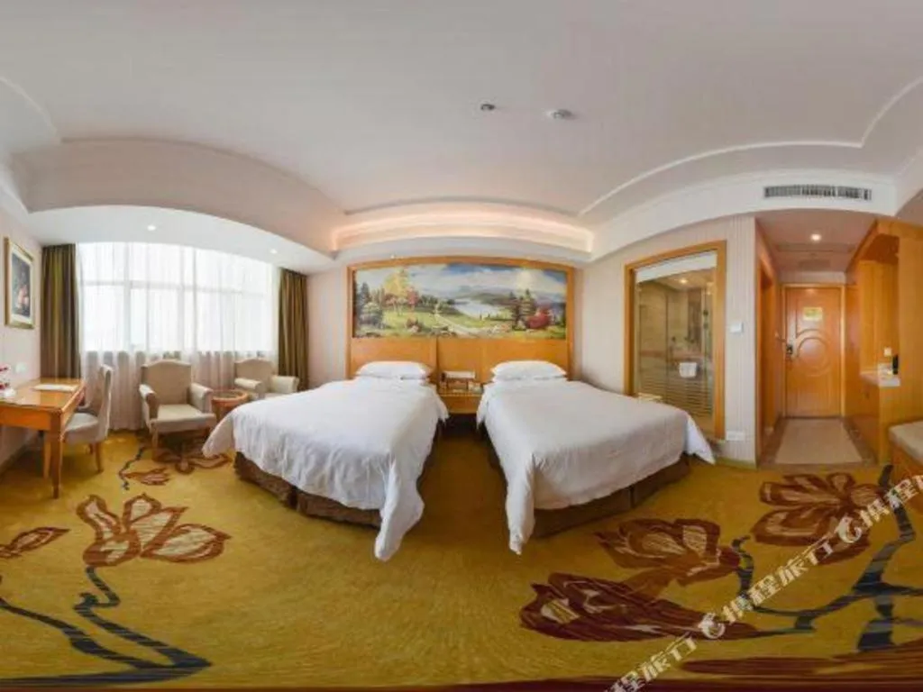 Bed in Vienna Hotel Guangdong Huiyang Qiuchang Yingbin Road