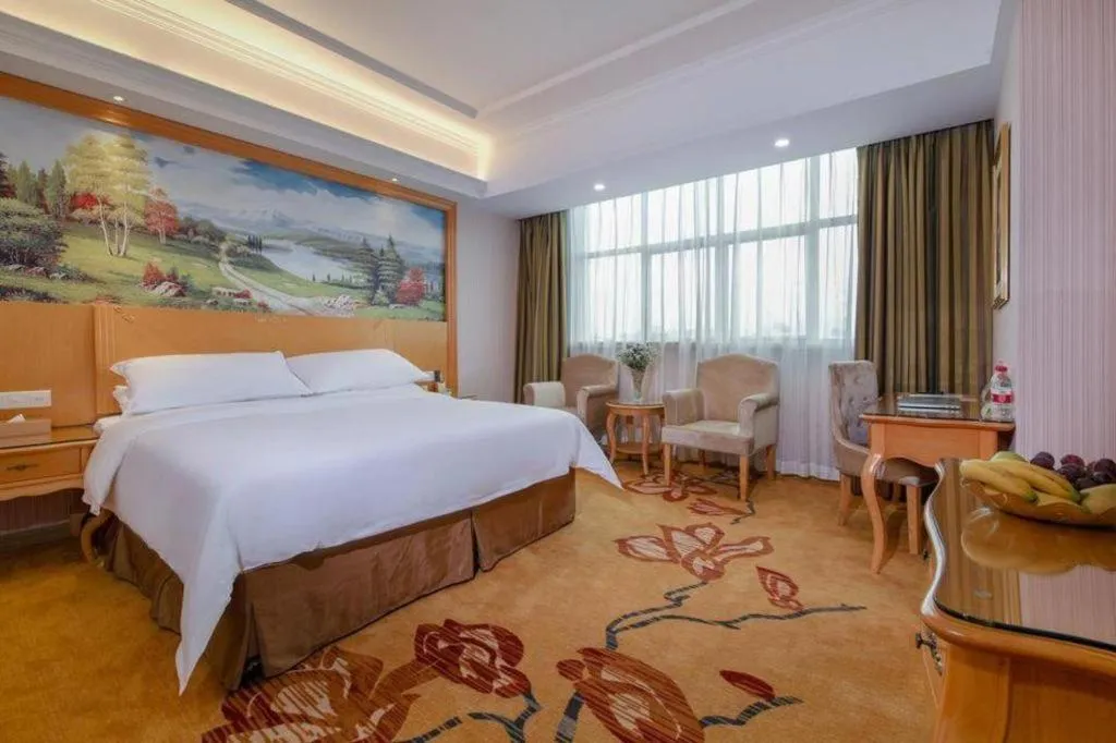 Bed in Vienna Hotel Guangdong Huiyang Qiuchang Yingbin Road