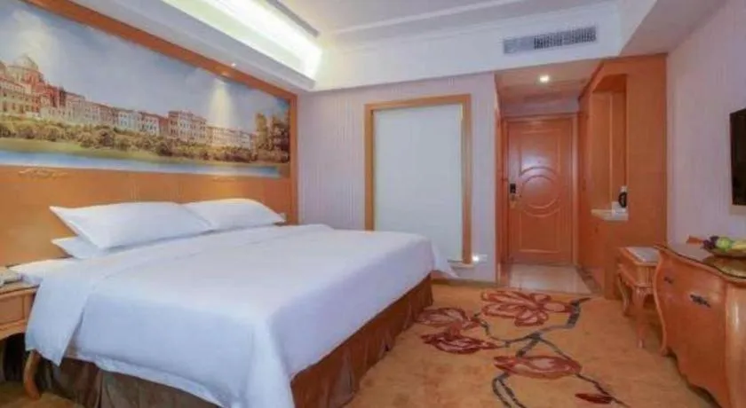 Bed in Vienna Hotel Guangdong Huiyang Qiuchang Yingbin Road