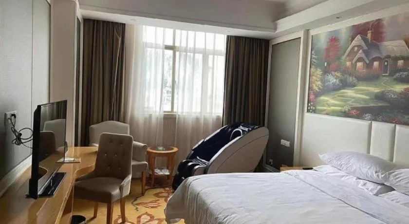 Bed in Vienna Hotel Guangdong Huiyang Qiuchang Yingbin Road