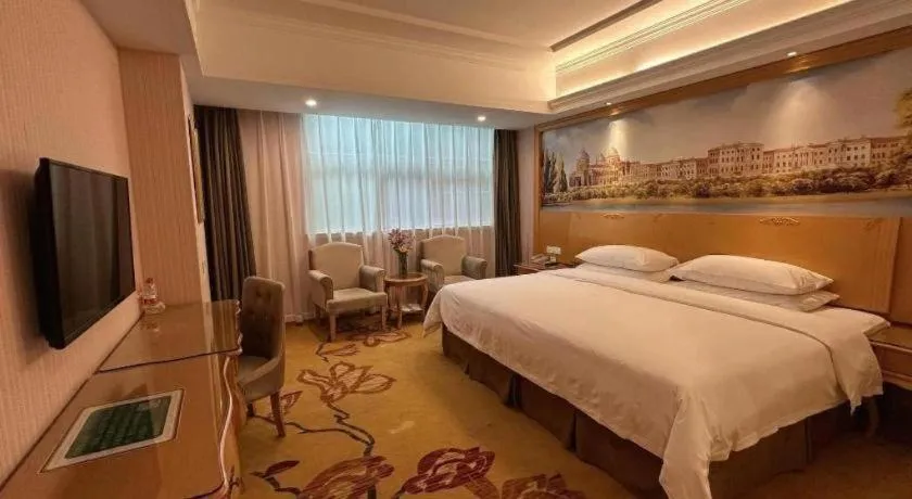 Bed in Vienna Hotel Guangdong Huiyang Qiuchang Yingbin Road