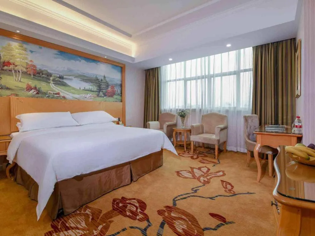 Bed in Vienna Hotel Guangdong Huiyang Qiuchang Yingbin Road