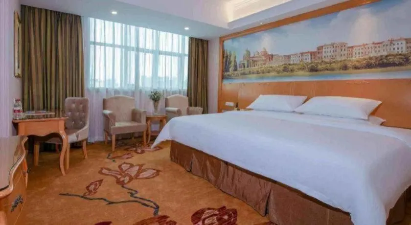 Bed in Vienna Hotel Guangdong Huiyang Qiuchang Yingbin Road