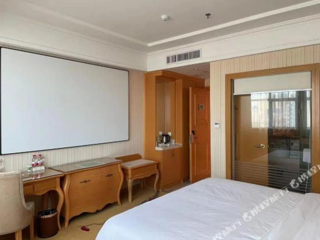 Bed in Vienna Hotel Guangdong Huiyang Qiuchang Yingbin Road