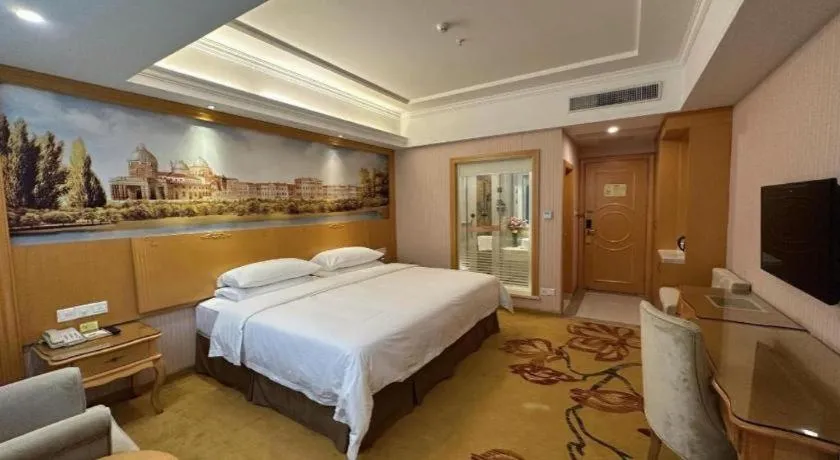 Bed in Vienna Hotel Guangdong Huiyang Qiuchang Yingbin Road