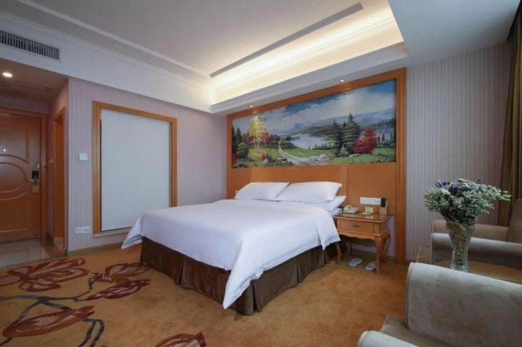 Bed in Vienna Hotel Guangdong Huiyang Qiuchang Yingbin Road