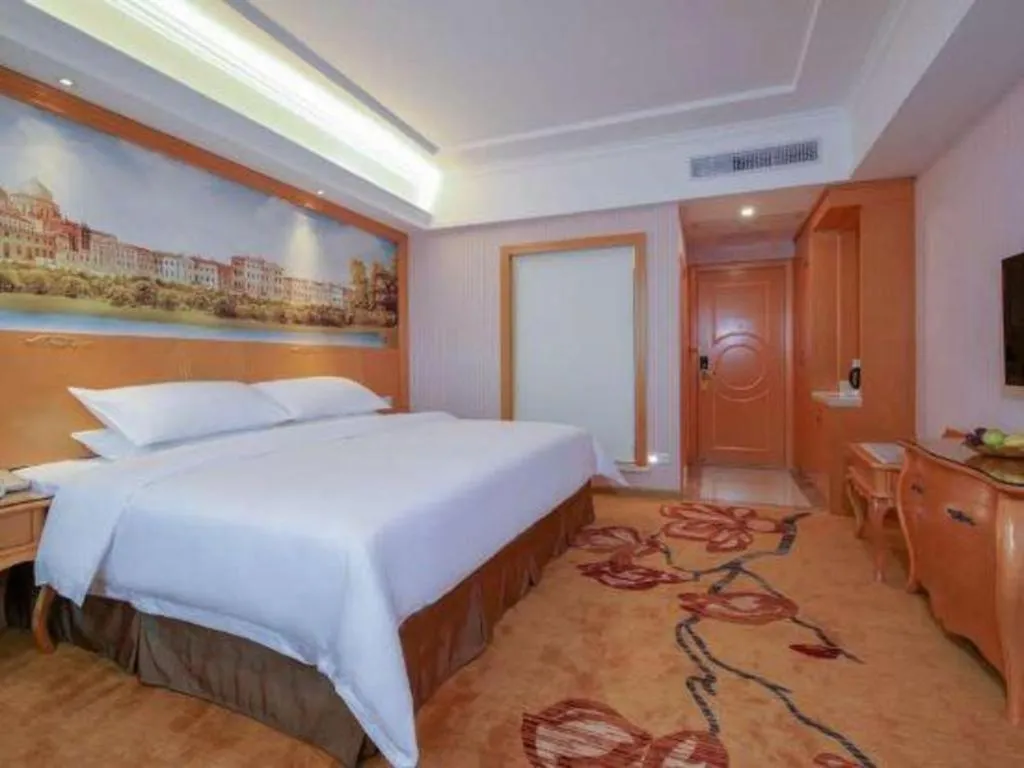 Bed in Vienna Hotel Guangdong Huiyang Qiuchang Yingbin Road