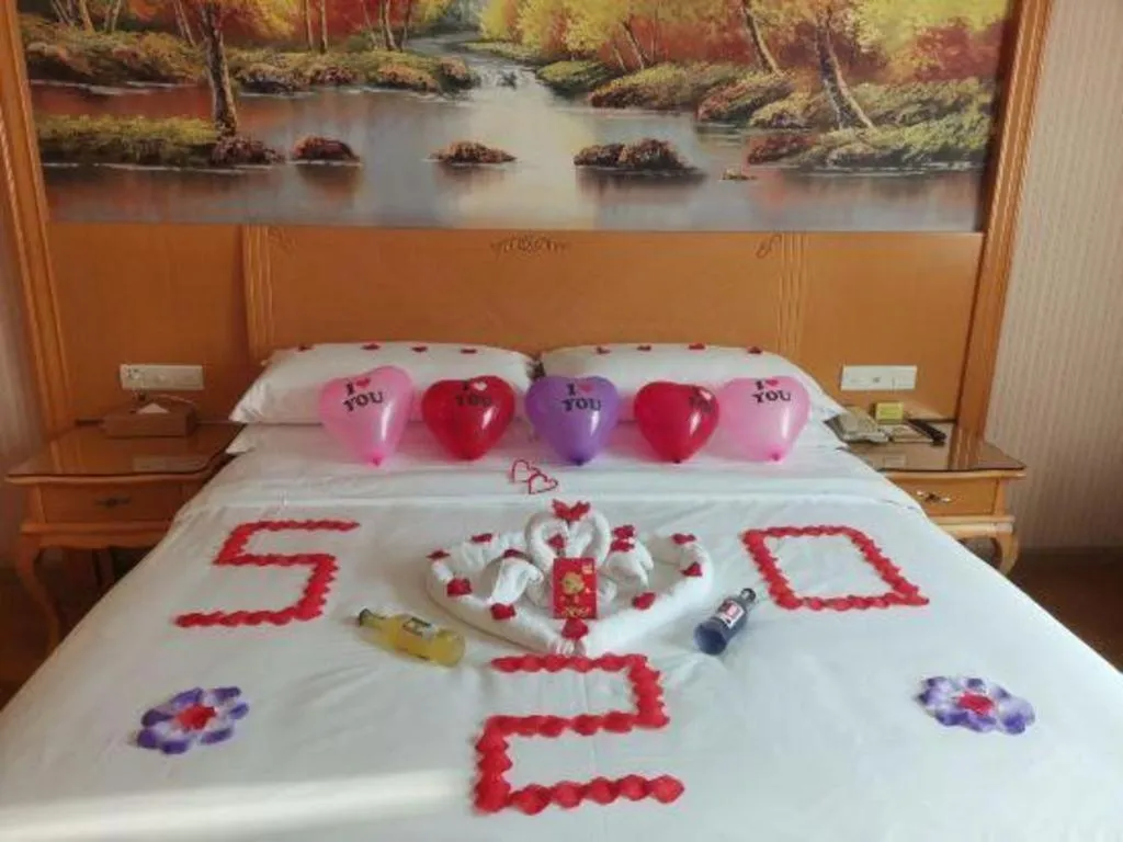 Bed in Vienna Hotel Guangdong Huiyang Qiuchang Yingbin Road