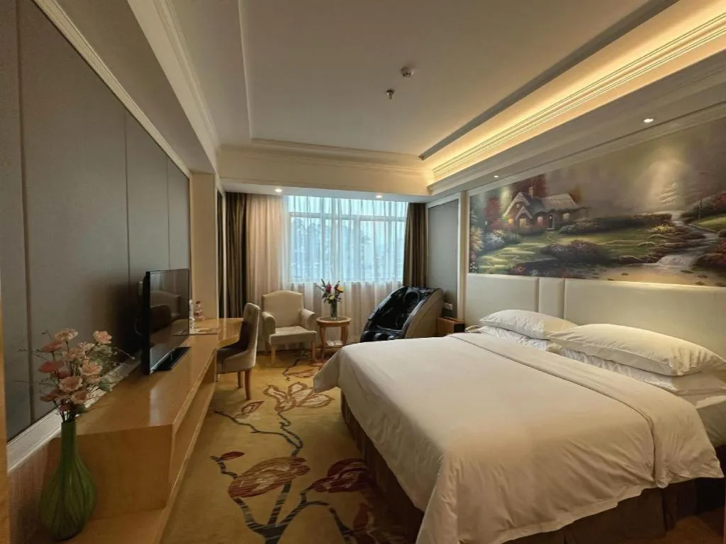 Bed in Vienna Hotel Guangdong Huiyang Qiuchang Yingbin Road