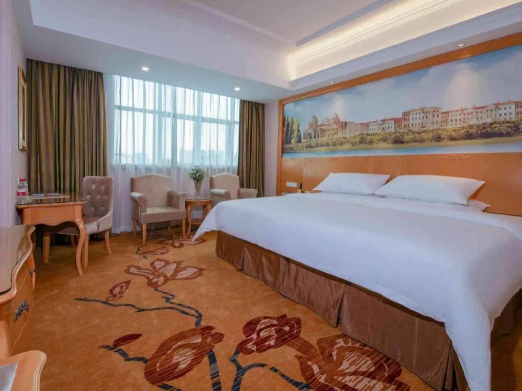 Bed in Vienna Hotel Guangdong Huiyang Qiuchang Yingbin Road