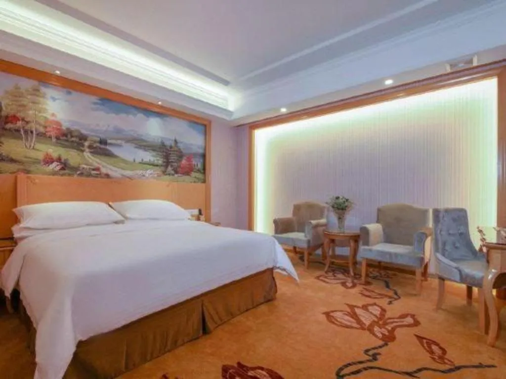 Bed in Vienna Hotel Guangdong Huiyang Qiuchang Yingbin Road