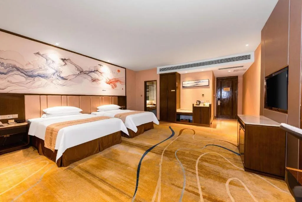 Bed in Venus Royal Hotel Nanning East High-Speed Railway Station