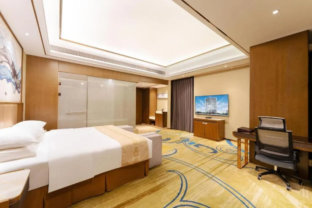 Bed in Venus Royal Hotel Nanning East High-Speed Railway Station