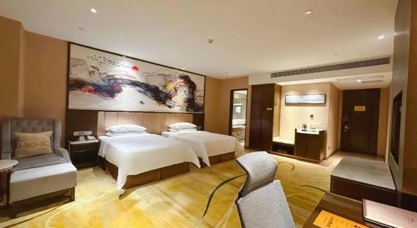 Bed in Venus Royal Hotel Nanning East High-Speed Railway Station