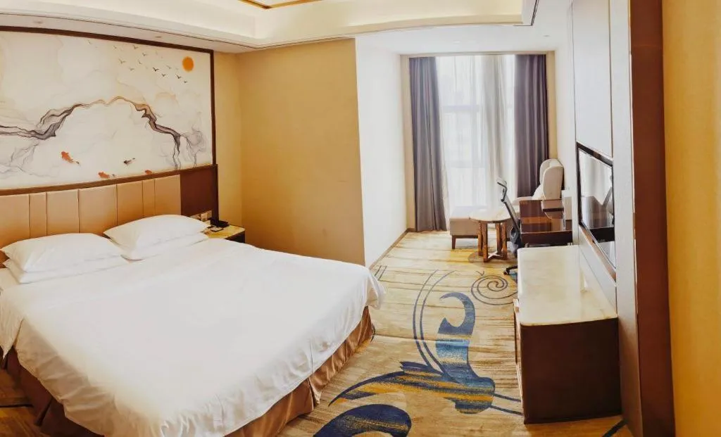 Bed in Venus Royal Hotel Nanning East High-Speed Railway Station