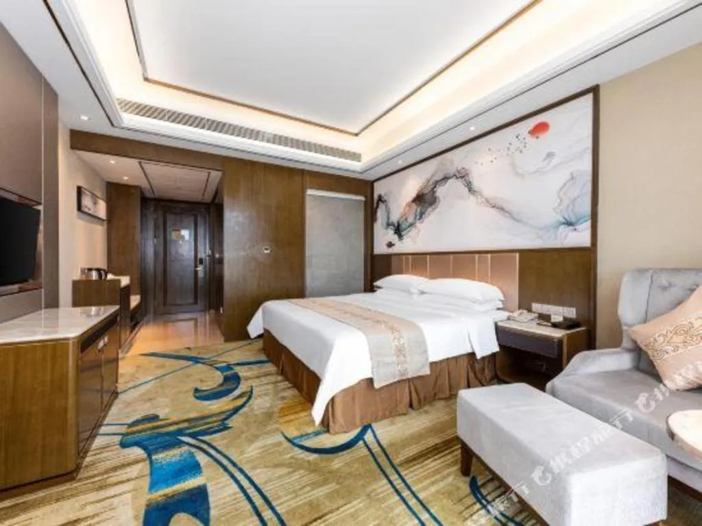 Bed in Venus Royal Hotel Nanning East High-Speed Railway Station