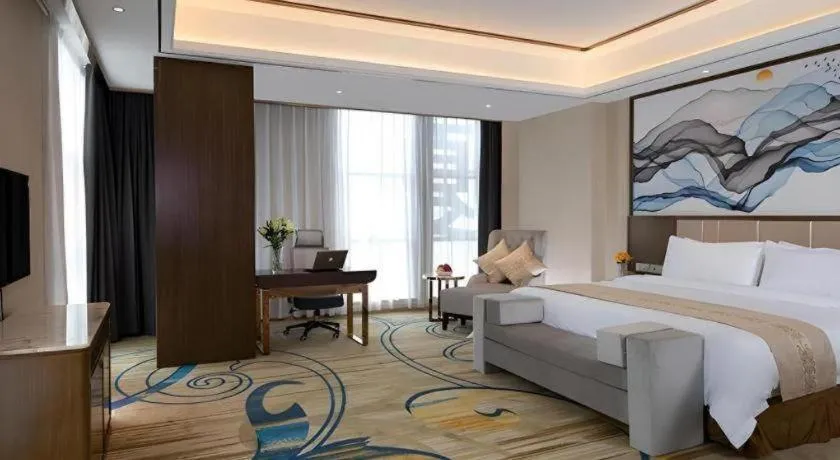 Bed in Venus Royal Hotel Nanning East High-Speed Railway Station